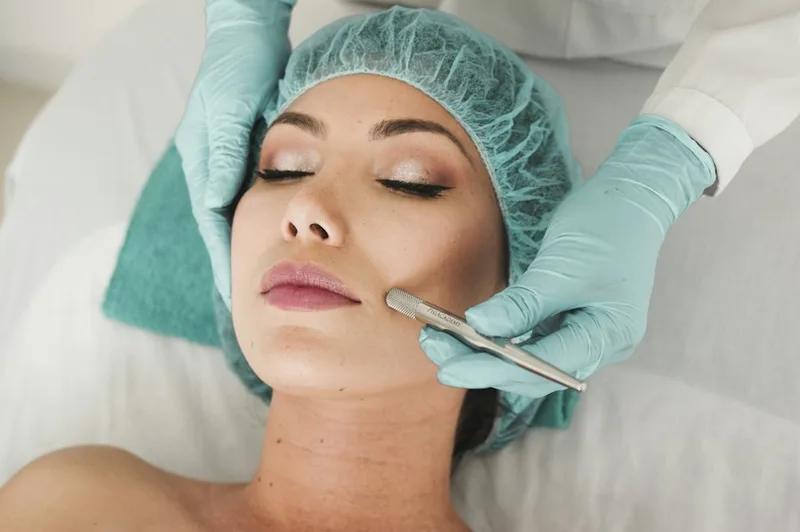 A facial treatment using a handheld device